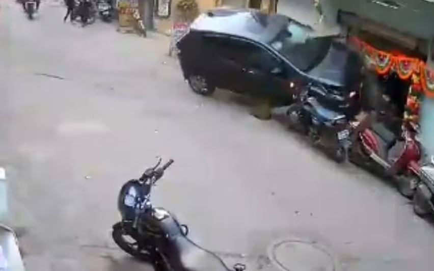 Car crushes girls making Rangoli