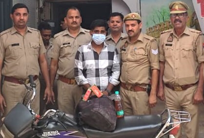 A bike riding youth arrested with 45 pavs of country liquor, sent to jail