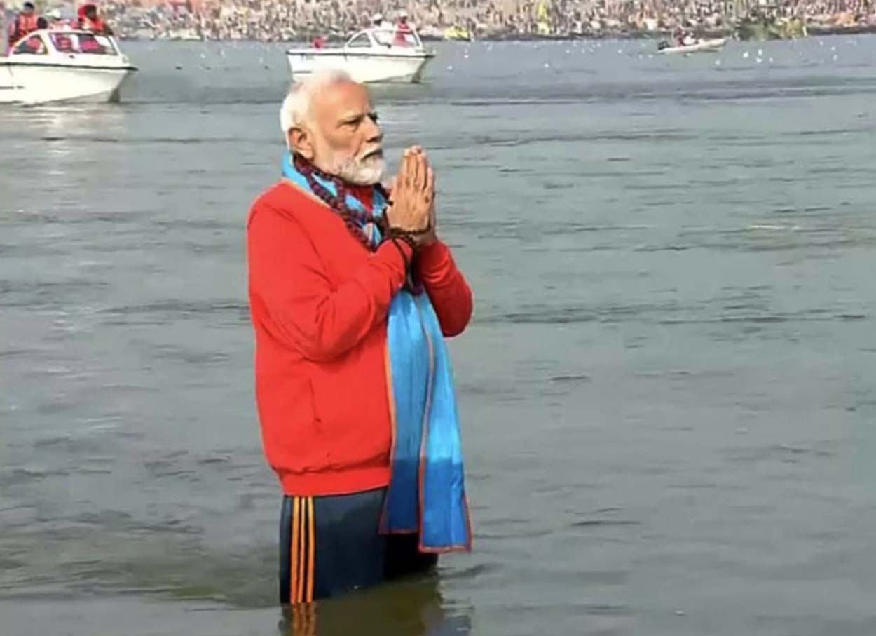 Rudraksha rosary in hand, chanting mantras