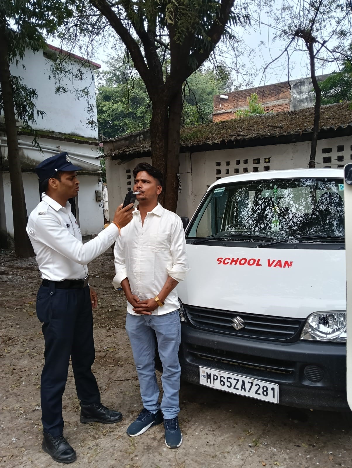Action taken against drunk driver driving school van at Amarkantak Tiraha
